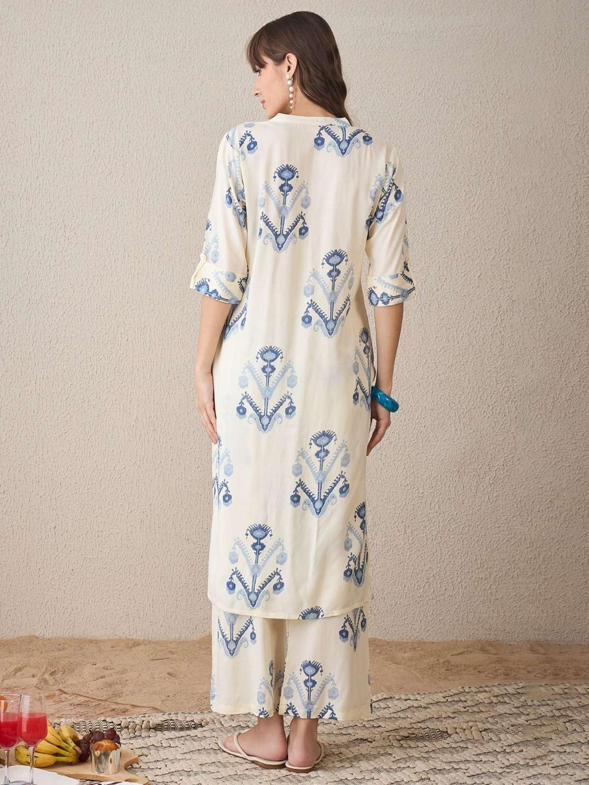 Women's Cotton  Printed flared kurti with V-neckline and side pockets paired with Matching PalAMzo Pant (Off White)