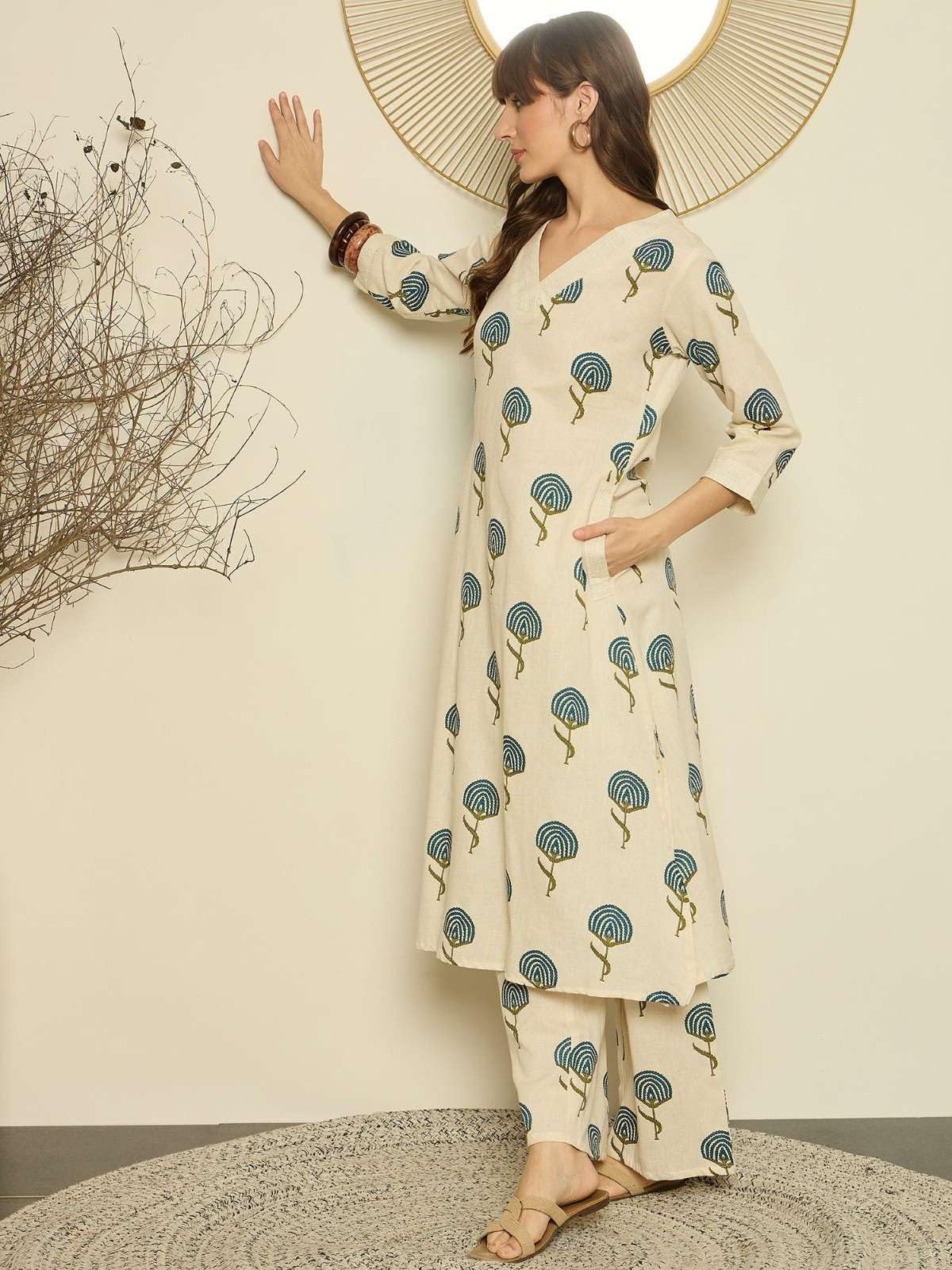 Women's Cotton  Printed flared kurti with V-neckline and side pockets paired with Matching PalAMzo Pant (Beige)