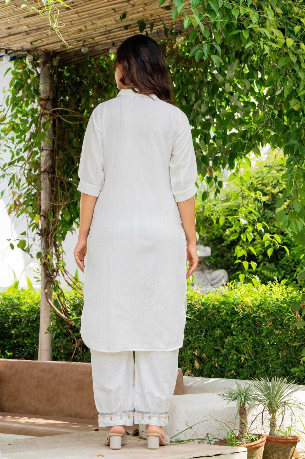 Women's Cotton Embroidered mirror Work kurti while the relaxed fit and palAMzo Pant (White)