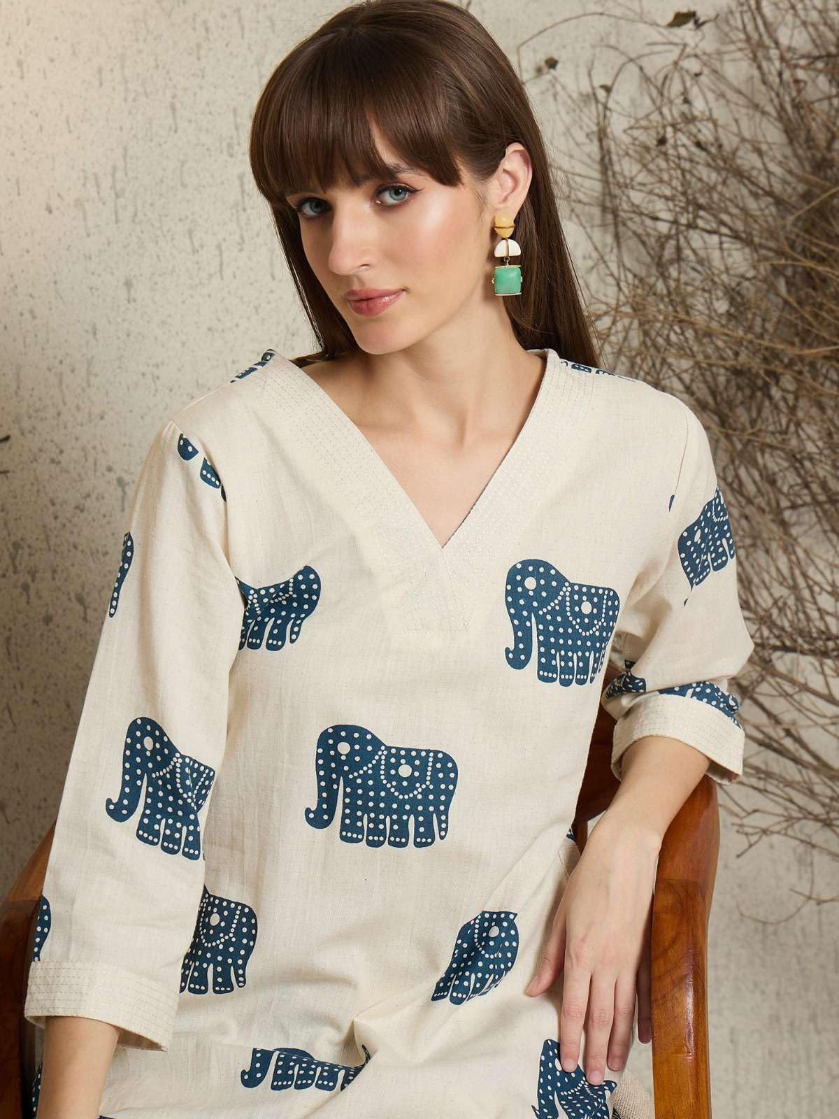 Women's Cotton Elephant printed flared kurti with V-neckline and side pockets paired with Matching PalAMzo Pant (Off White)