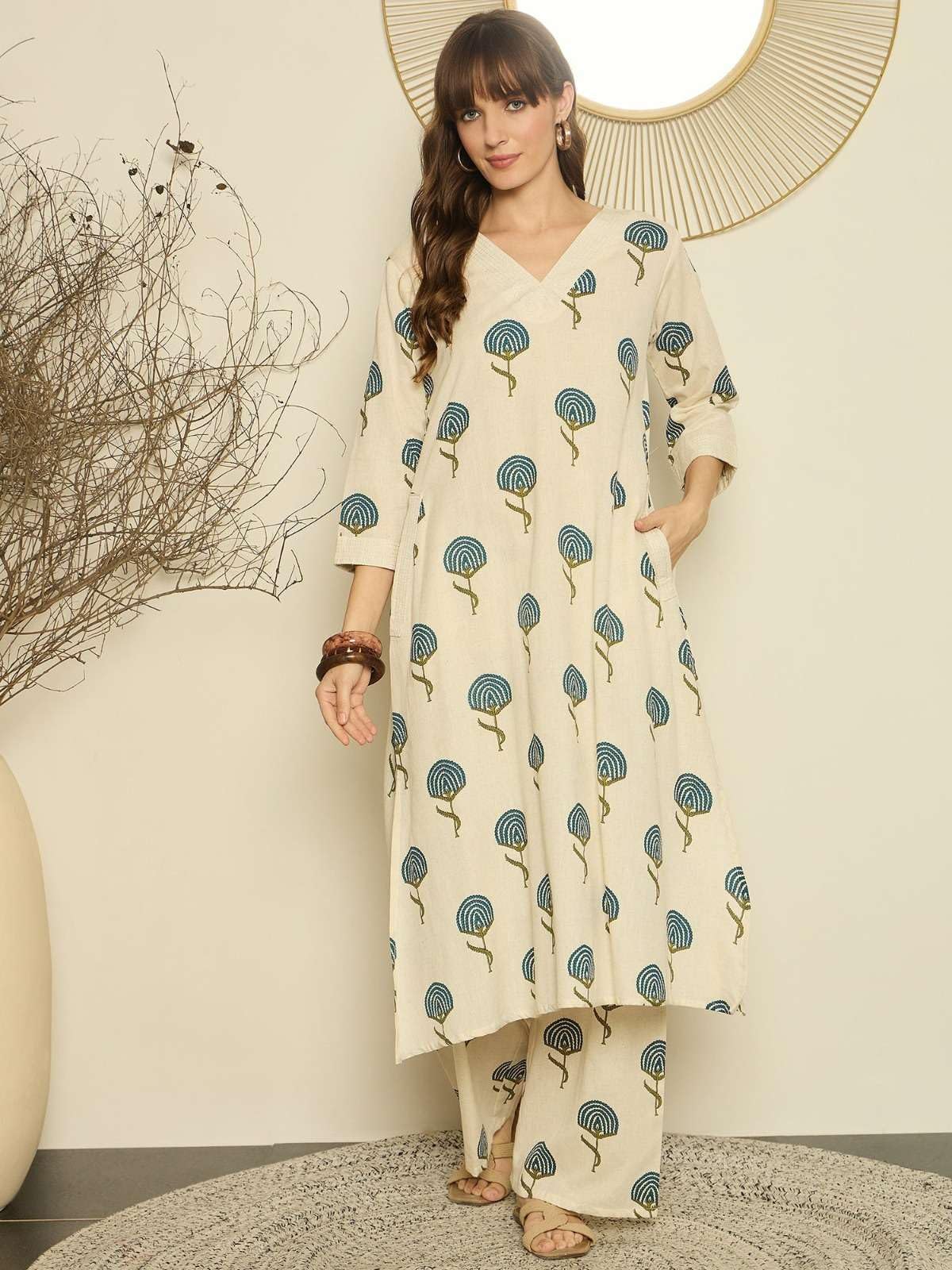 Women's Cotton  Printed flared kurti with V-neckline and side pockets paired with Matching PalAMzo Pant (Beige)