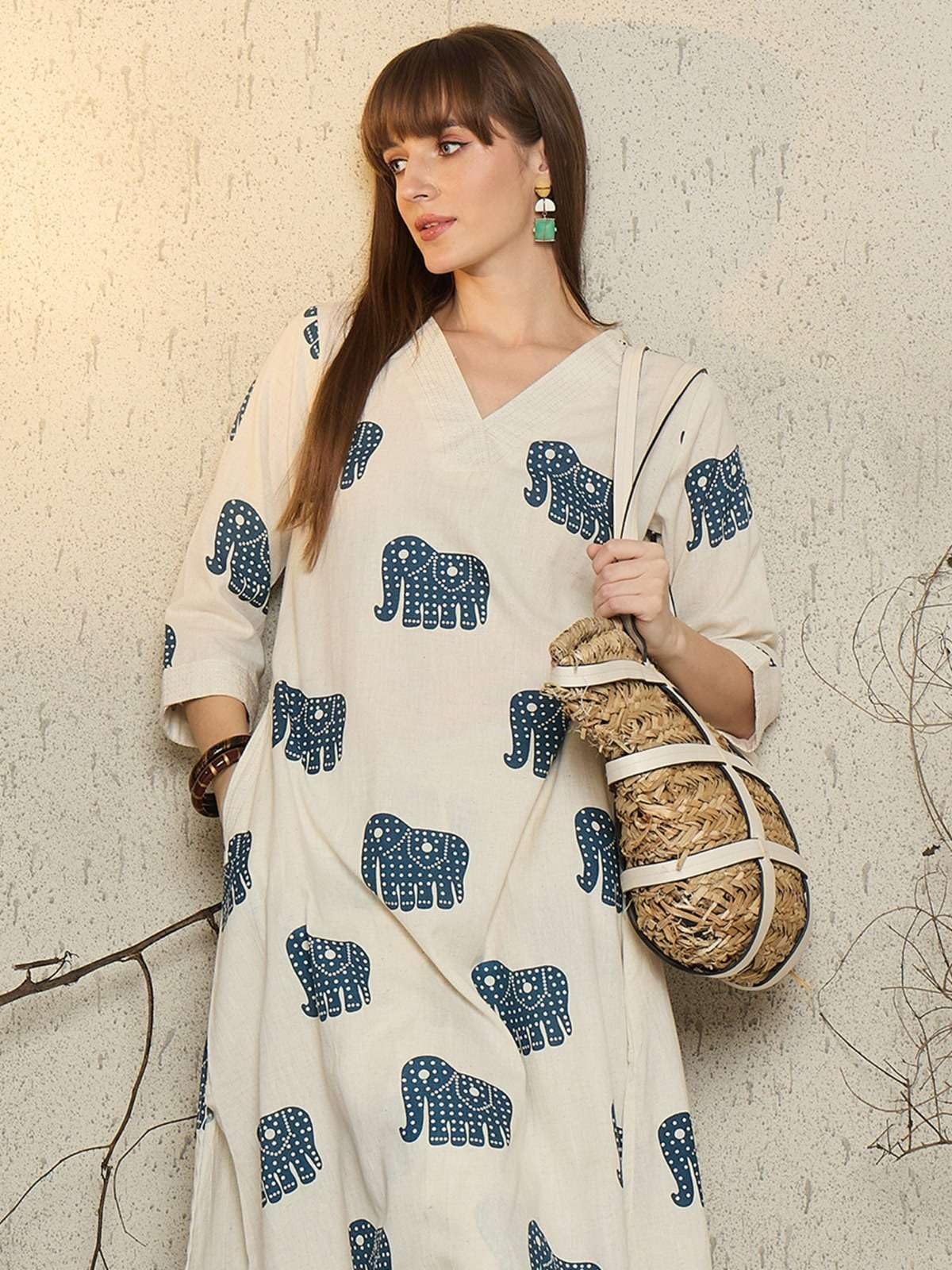 Women's Cotton Elephant printed flared kurti with V-neckline and side pockets paired with Matching PalAMzo Pant (Off White)